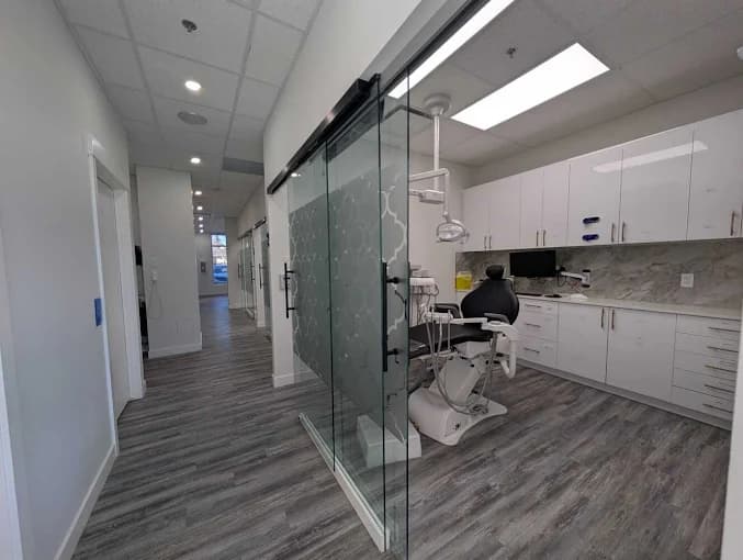 Private treatment room with a glass sliding door at Rundlehorn Smiles Dental