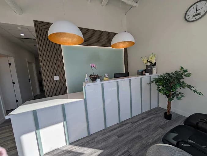 Front reception desk at Rundlehorn Smiles Dental in NE Calgary